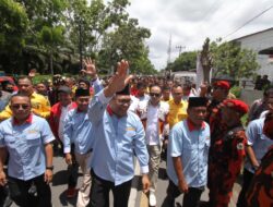 Diiringi Ribuan Masyarakat Mendaftar ke KPU Deliserdang Pasangan Asri Ludin Tambunan